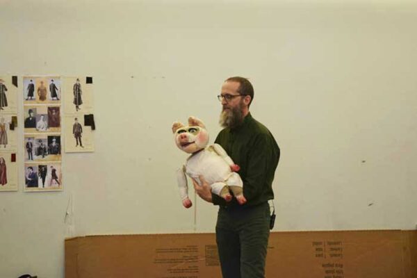 Mr. and Mrs. Pennyworth. Blair Thomas demonstrates a puppet.